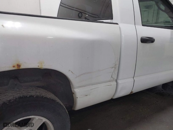 2005 Dodge Ram 1500 SLT with VIN 1D7HU16DX5J547792, listed as a IAAI auction lot 41609415 with 209,063 mi miles. Bid and sale history available at carsss.com. Image 6.