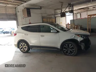 2017 Hyundai Santa Fe Ultimate with VIN 5XYZWDLA2HG491338, listed as a IAAI auction lot 42590671 with 114,521 mi miles and . Bid and sale history available at DreamBid. Image 14.