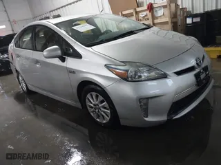 2014 Toyota Prius Plug-In with VIN JTDKN3DP4E3056841, listed as a IAAI auction lot 41384267 with 318,735 mi miles. Bid and sale history available at carsss.com. Image 1.