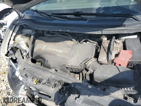 2011 Lincoln MKX z VIN 2LMDJ8JK6BBJ08962, wystawiony jako Copart lot #54329225 z przebiegiem 183 883 mil mil oraz Szkoda całkowita • Salvage title. Historia ofert i sprzedaży dostępna na DreamBid. Obrazek 12.