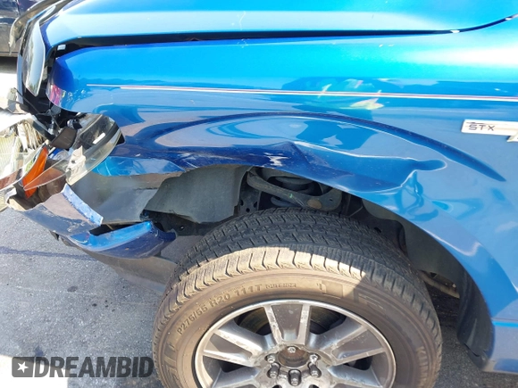 2014 Ford F-150 XL with VIN 1FTEW1CM7EKF31796, listed as a IAAI auction lot 42612772 with 183,685 mi miles and . Bid and sale history available at DreamBid. Image 6.