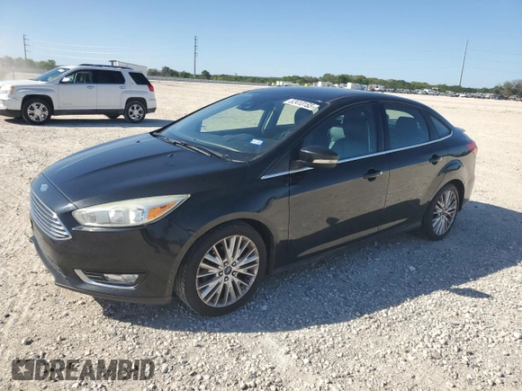 2015 Ford Focus Titanium with VIN 1FADP3J24FL305710, listed as a Copart auction lot 52413155 with 181,571 mi miles and Clean Title. Bid and sale history available at carsss.com. Image 1.