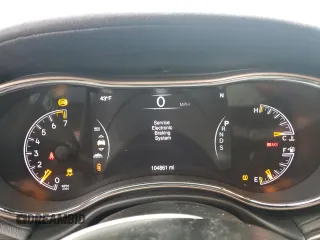 2014 Jeep Grand Cherokee Overland with VIN 1C4RJFCG7EC572298, listed as a Copart auction lot 83970004 with 104,861 mi miles and Salvage Title. Bid and sale history available at DreamBid. Image 9.
