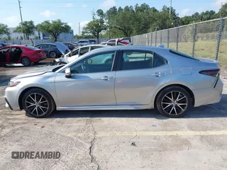 2023 Toyota Camry SE with VIN 4T1G11AK5PU750719, listed as a IAAI auction lot 42133210 with 55,688 mi miles. Bid and sale history available at carsss.com. Image 14.