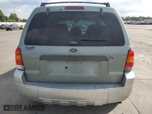 2005 Ford Escape Hybrid z VIN 1FMCU95HX5KE24619, wystawiony jako Copart lot #60624765 z przebiegiem 209 937 mil mil oraz Nie do naprawy • Non repairable. Historia ofert i sprzedaży dostępna na DreamBid. Obrazek 6.