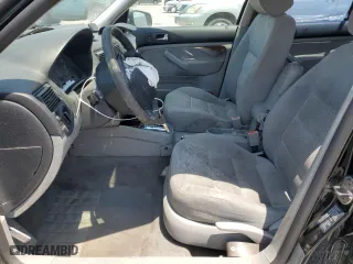 2003 Volkswagen Golf GLS with VIN 9BWGK61J334073949, listed as a Copart auction lot 64709734 with 186,113 mi miles and Salvage Title. Bid and sale history available at carsss.com. Image 7.