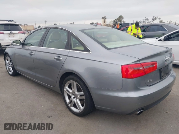 2015 Audi A6 Premium Plus z VIN WAUGFAFC6FN009203, wystawiony jako IAAI lot #42242726 z przebiegiem 69 163 mil mil oraz . Historia ofert i sprzedaży dostępna na DreamBid. Obrazek 3.