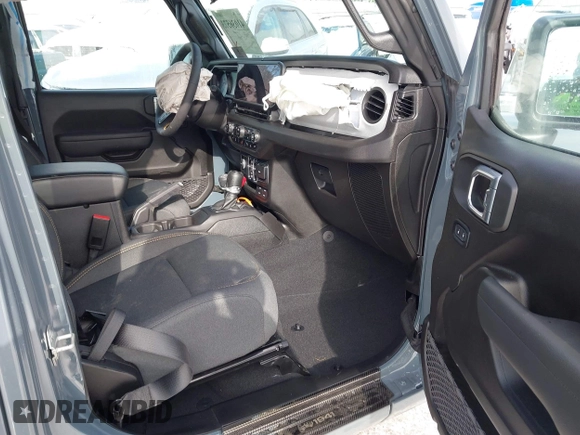 2024 Jeep Wrangler Sport S with VIN 1C4PJXDN2RW306332, listed as a IAAI auction lot 41036573 with 1,785 mi miles and . Bid and sale history available at DreamBid. Image 5.