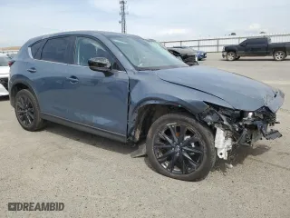 2024 Mazda CX-5 2.5 S Carbon Edition with VIN JM3KFBCL2R0521170, listed as a Copart auction lot 53203485 with 0 mi miles and Non Repairable. Bid and sale history available at carsss.com. Image 4.