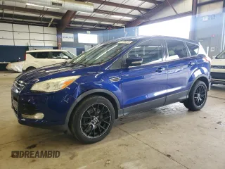 2013 Ford Escape SEL z VIN 1FMCU9HX7DUC87287, wystawiony jako Copart lot #61798475 z przebiegiem 147 521 mil mil oraz Czysty tytuł • Clean title. Historia ofert i sprzedaży dostępna na DreamBid. Obrazek 1.
