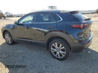 2023 Mazda CX-30 S Carbon Edition with VIN 3MVDMBCM8PM567157, listed as a Copart auction lot 46954865 with 20,038 mi miles and Salvage Title. Bid and sale history available at DreamBid. Image 2.