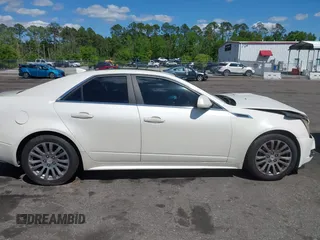 2013 Cadillac CTS Performance with VIN 1G6DK5E37D0138249, listed as a IAAI auction lot 41991166 with 121,133 mi miles and . Bid and sale history available at DreamBid. Image 12.