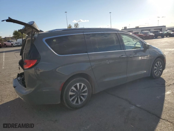 2021 Chrysler Pacifica Hybrid Touring L with VIN 2C4RC1L73MR581213, listed as a Copart auction lot 78910244 with 104,426 mi miles and Salvage Title. Bid and sale history available at carsss.com. Image 3.
