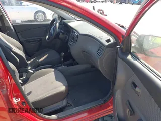 2011 Kia Rio LX with VIN KNADH4A34B6848891, listed as a IAAI auction lot 41678155 with 152,021 mi miles. Bid and sale history available at carsss.com. Image 5.