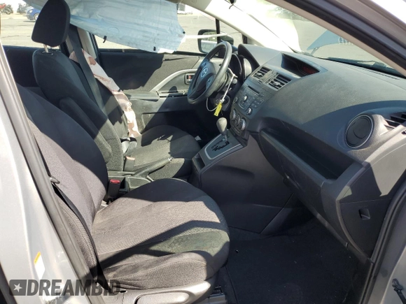 2012 Mazda 5 Sport with VIN JM1CW2BL4C0107068, listed as a Copart auction lot 62880615 with 142,610 mi miles and Salvage title. Bid and sale history available at DreamBid. Image 7.
