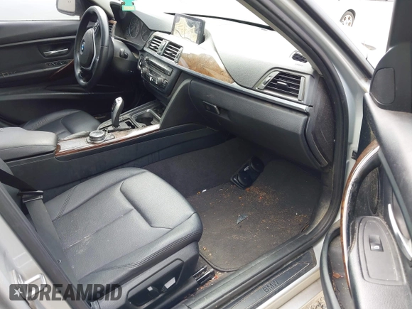 2014 BMW 3 Series 328i with VIN WBA3A5G52ENP31318, listed as a IAAI auction lot 42801411 with 149,355 mi miles and . Bid and sale history available at DreamBid. Image 5.