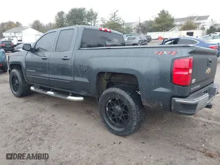 2018 Chevrolet Silverado 1500 LT with VIN 1GCVKREC4JZ141125, listed as a IAAI auction lot 41474345 with 198,197 mi miles. Bid and sale history available at carsss.com. Image 3.