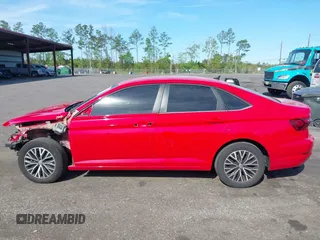 2021 Volkswagen Jetta S z VIN 3VWC57BU3MM016295, wystawiony jako IAAI lot #41880683 z przebiegiem 85 113 mil mil oraz . Historia ofert i sprzedaży dostępna na DreamBid. Obrazek 14.