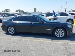 2015 BMW 7 Series 740Li with VIN WBAYE4C57FD138961, listed as a IAAI auction lot 42216122 with 224,740 mi miles and . Bid and sale history available at carsss.com. Image 12.