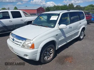 2004 Suzuki XL7 LX z VIN JS3TX92V344103015, wystawiony jako IAAI lot #42187592 z przebiegiem 161 614 mil mil oraz . Historia ofert i sprzedaży dostępna na DreamBid. Obrazek 2.