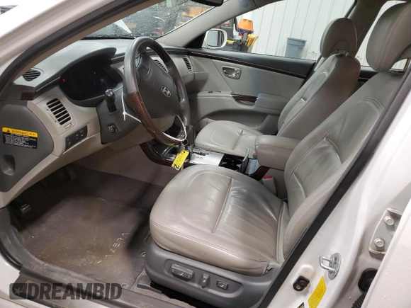 2009 Hyundai Azera Limited z VIN KMHFC46F29A371099, wystawiony jako Copart lot #57395815 z przebiegiem 69 313 mil mil oraz Szkoda całkowita • Salvage title. Historia ofert i sprzedaży dostępna na DreamBid. Obrazek 7.