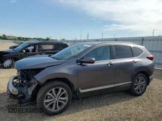 2020 Honda CR-V Touring с VIN 2HKRW2H99LH677964, выставлен на аукционе Copart как лот 61169915 с пробегом 65 915 миль миль и Списание • Salvage title. История ставок и продаж доступна на DreamBid. Изображение 1.
