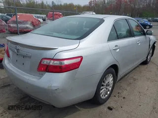 2007 Toyota Camry CE with VIN 4T1BE46K47U528827, listed as a IAAI auction lot 42123907 with 257,248 mi miles. Bid and sale history available at carsss.com. Image 4.