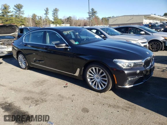2017 BMW 7 Series 740i xDrive with VIN WBA7E4C58HGU99127, listed as a Copart auction lot 70320002 with 62,489 mi miles. Bid and sale history available at carsss.com. Image 4.
