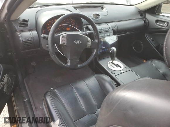 2004 Infiniti G35 Coupe w/Leather with VIN JNKCV54E44M303989, listed as a Copart auction lot 84652384 with 127,747 mi miles and Salvage Title. Bid and sale history available at carsss.com. Image 8.