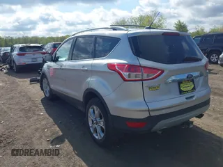 2015 Ford Escape Titanium z VIN 1FMCU9J99FUC75852, wystawiony jako IAAI lot #42171467 z przebiegiem 113 322 mil mil oraz . Historia ofert i sprzedaży dostępna na DreamBid. Obrazek 3.