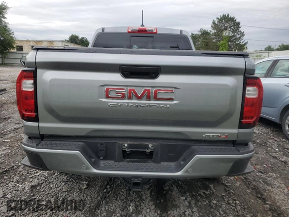 2023 GMC Canyon 4WD AT4 with VIN 1GTP6DEK4P1124937, listed as a Copart auction lot 66103474 with 10,566 mi miles and Salvage Title. Bid and sale history available at carsss.com. Image 6.