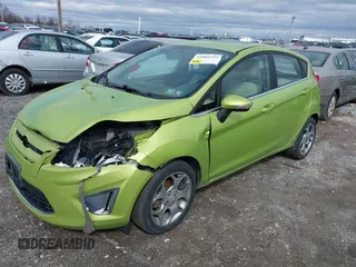 2011 Ford Fiesta SES with VIN 3FADP4FJ7BM131503, listed as a IAAI auction lot 41804351 with 233,620 mi miles. Bid and sale history available at carsss.com. Image 2.