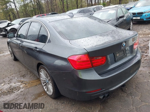 2012 BMW 3 Series 328i with VIN WBA3A5C50CF342321, listed as a IAAI auction lot 41914770 with 185,315 mi miles. Bid and sale history available at carsss.com. Image 3.