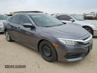 2017 Honda Civic LX z VIN 19XFC2F53HE043251, wystawiony jako Copart lot #53965175 z przebiegiem 91 156 mil mil oraz Czysty tytuł • Clean title. Historia ofert i sprzedaży dostępna na DreamBid. Obrazek 4.