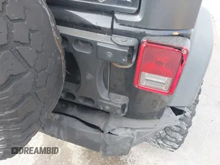 2017 Jeep Wrangler Unlimited Sport with VIN 1C4BJWDG1HL733474, listed as a IAAI auction lot 41395245 with 275,871 mi miles. Bid and sale history available at carsss.com. Image 12.
