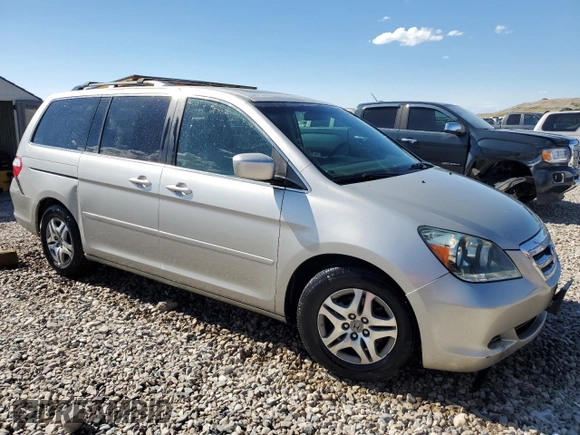 2007 Honda Odyssey EX-L z VIN 5FNRL38647B028078, wystawiony jako Copart lot #56208005 z przebiegiem 192 000 mil mil oraz Szkoda całkowita • Salvage title. Historia ofert i sprzedaży dostępna na DreamBid. Obrazek 4.