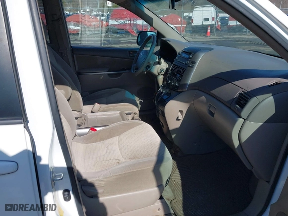 2010 Toyota Sienna CE with VIN 5TDKK4CC0AS329537, listed as a IAAI auction lot 41659723 with 258,226 mi miles. Bid and sale history available at carsss.com. Image 5.