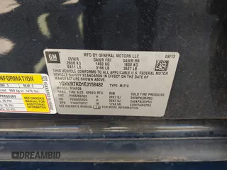 2014 GMC Acadia Denali with VIN 1GKKRTKD1EJ158482, listed as a IAAI auction lot 41826579 with 167,043 mi miles. Bid and sale history available at carsss.com. Image 9.