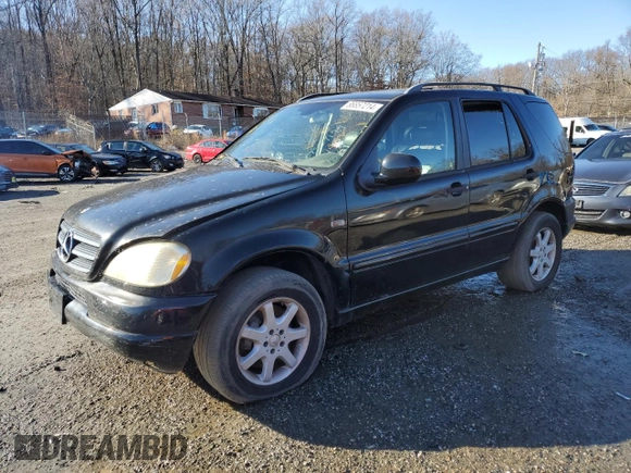 2001 Mercedes-Benz M 320/430/500 with VIN 4JGAB72EX1A277472, listed as a Copart auction lot 86857214 with Not provided miles and Salvage title. Bid and sale history available at DreamBid. Image 1.