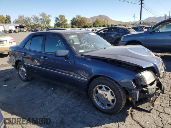 1996 Mercedes-Benz C with VIN WDBHA28E5TF406948, listed as a Copart auction lot 80234944 with 239,256 mi miles and Salvage Title. Bid and sale history available at carsss.com. Image 4.