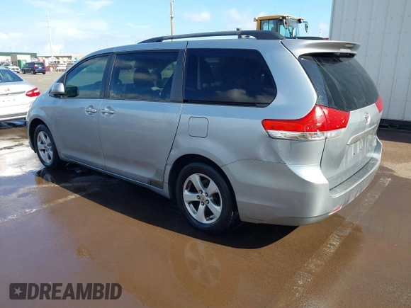 2011 Toyota Sienna LE AAS with VIN 5TDKK3DC0BS085284, listed as a IAAI auction lot 41885049 with 146,799 mi miles and . Bid and sale history available at DreamBid. Image 3.