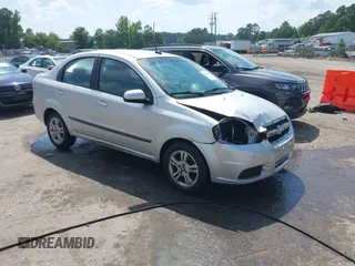 2011 Chevrolet Aveo 1LT with VIN KL1TD5DE9BB134041, listed as a IAAI auction lot 42621873 with 126,035 mi miles and . Bid and sale history available at DreamBid. Image 1.