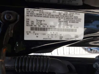 2016 Ford Focus SE with VIN 1FADP3FE6GL335943, listed as a IAAI auction lot 42060995 with 115,701 mi miles. Bid and sale history available at carsss.com. Image 9.