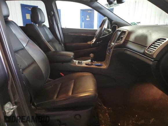 2014 Jeep Grand Cherokee Limited with VIN 1C4RJFBT8EC384064, listed as a Copart auction lot 44173625 with 198,428 mi miles and Salvage title. Bid and sale history available at DreamBid. Image 7.