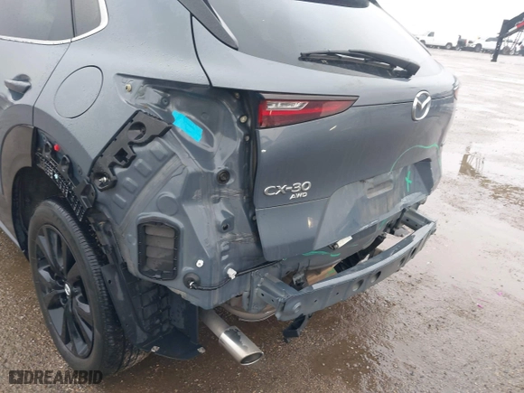2022 Mazda CX-30 2.5 S Preferred Package with VIN 3MVDMBCL4NM422122, listed as a IAAI auction lot 41598588 with 52,837 mi miles. Bid and sale history available at carsss.com. Image 6.