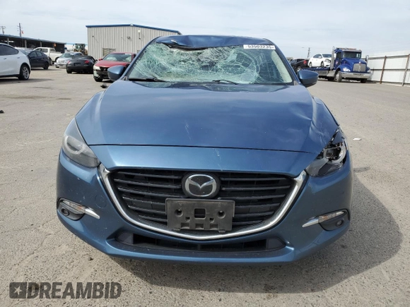 2017 Mazda 3 Grand Touring z VIN 3MZBN1M38HM147869, wystawiony jako Copart lot #53503235 z przebiegiem 99 074 mil mil oraz Szkoda całkowita • Salvage title. Historia ofert i sprzedaży dostępna na DreamBid. Obrazek 5.