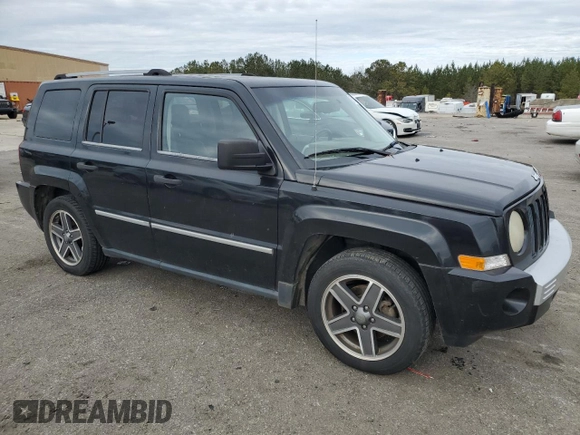2008 Jeep Patriot Limited with VIN 1J8FT48W68D796610, listed as a Copart auction lot 87911365 with 219,119 mi miles and Salvage Title. Bid and sale history available at DreamBid. Image 4.