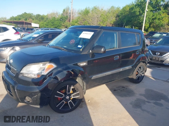 2010 Kia Soul + with VIN KNDJT2A25A7127326, listed as a IAAI auction lot 41966153 with 216,660 mi miles. Bid and sale history available at carsss.com. Image 2.