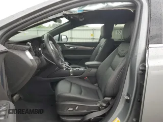 2023 Cadillac XT5 FWD Luxury z VIN 1GYKNAR47PZ144988, wystawiony jako Copart lot #50830365 z przebiegiem 17 687 mil mil oraz Szkody całkowita. Historia ofert i sprzedaży dostępna na DreamBid. Obrazek 7.