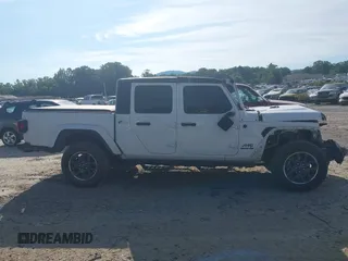 2021 Jeep Gladiator Willys с VIN 1C6HJTAG0ML523351, выставлен на аукционе IAAI как лот 42653040 с пробегом 38 912 миль миль и . История ставок и продаж доступна на DreamBid. Изображение 13.